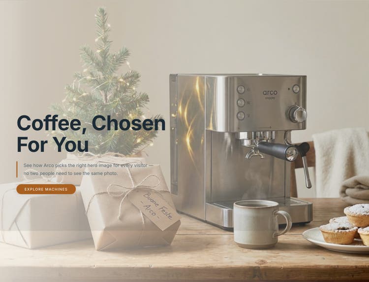 The same hero with a picked photo: an espresso machine beside a small Christmas tree and wrapped gifts.